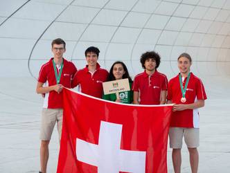 Swiss team at IOI 2019 after the medal ceremony